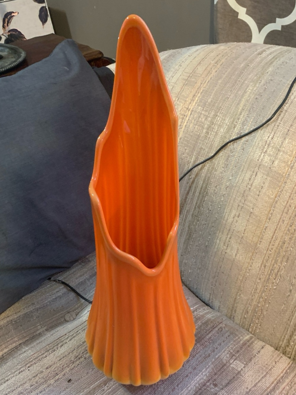 L.E. Smith Bittersweet Orange Swung Vase It's estimated to be worth $450-$495.